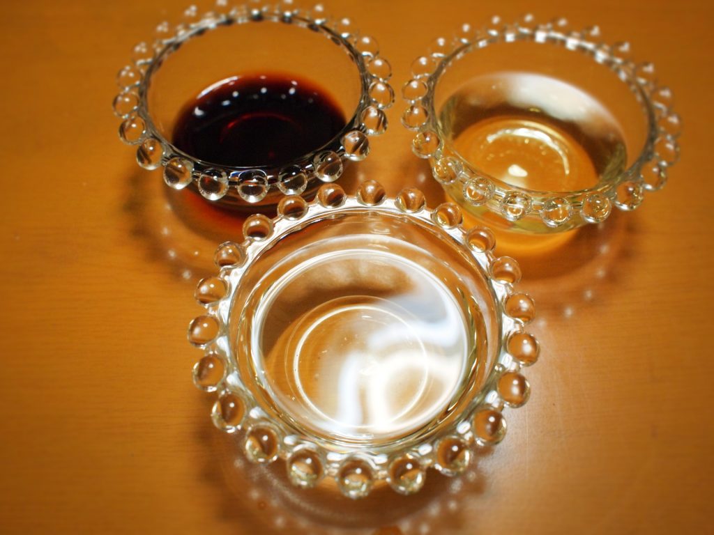 Soy sauce, mirin, and sake in equal 1:1:1 ratio being added to the pan